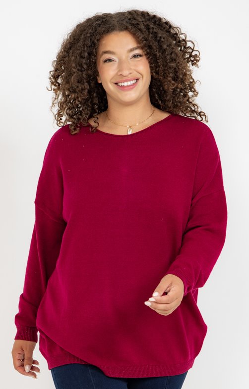 Pull avec boutons recouverts dans le dos