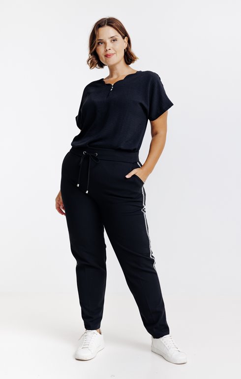 Pantalon style jogging bande paillette