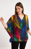 Poncho avec zip au col imprimé feuilles