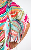Poncho palmes multicolore et collier