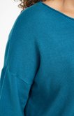 Pull avec boutons dans le dos