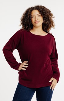 Pull avec boutons en forme de coeur