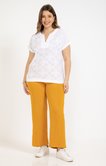 Pantalon fluide avec boutons recouverts