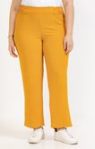 Pantalon fluide avec boutons recouverts