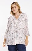 Chemise à pois volantée