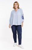 Chemise unie avec manches brodées