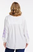 Chemise unie avec manches brodées