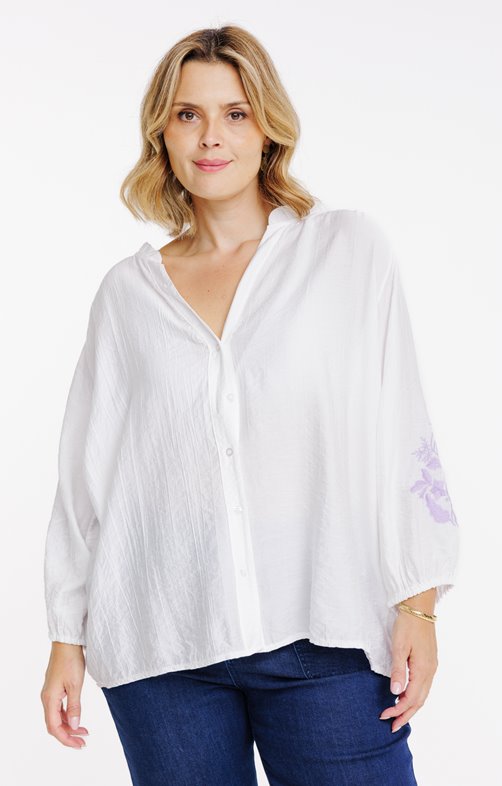 Chemise unie avec manches brodées