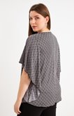Poncho imprimé losange avec bijou