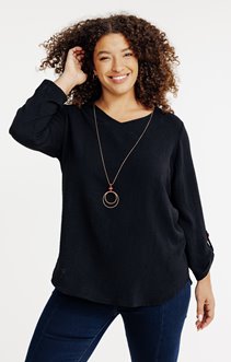 Tunique unie avec boutons colorés