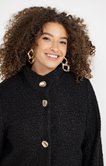 Manteau en bouclette