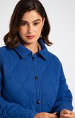 Veste unie à pressions avec surpiqûres