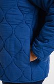 Veste unie à pressions avec surpiqûres