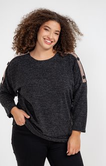 Pull avec boutons recouverts