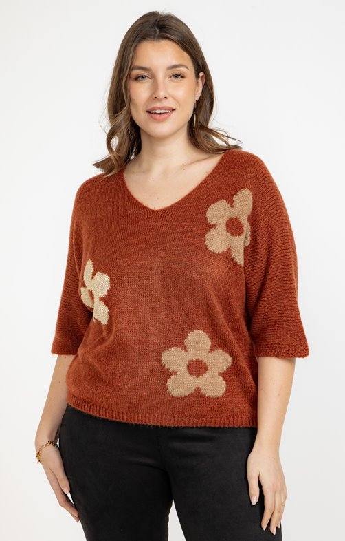 Pull avec fleurs dorées